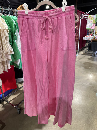 Pink pants on a rack with a blurred background