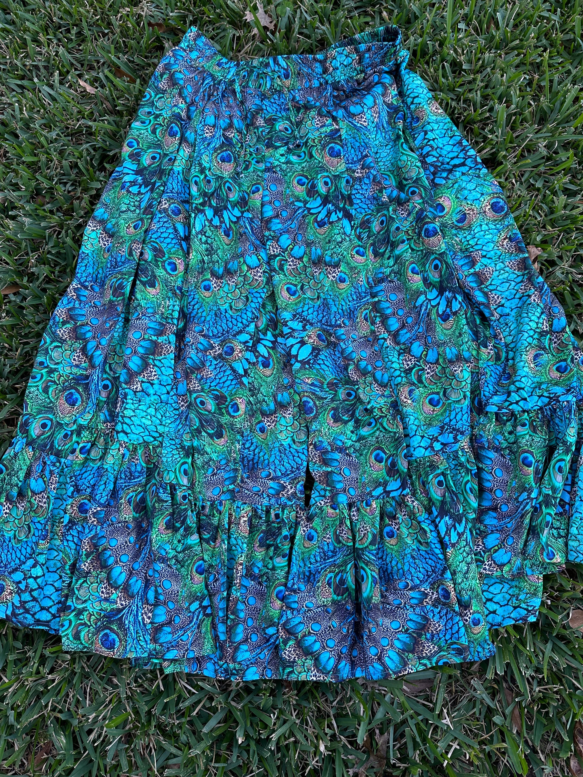 Colorful patterned pants on grass